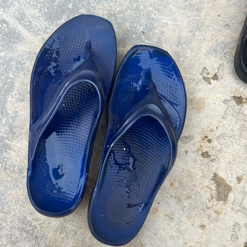 Blue oofo flip flops